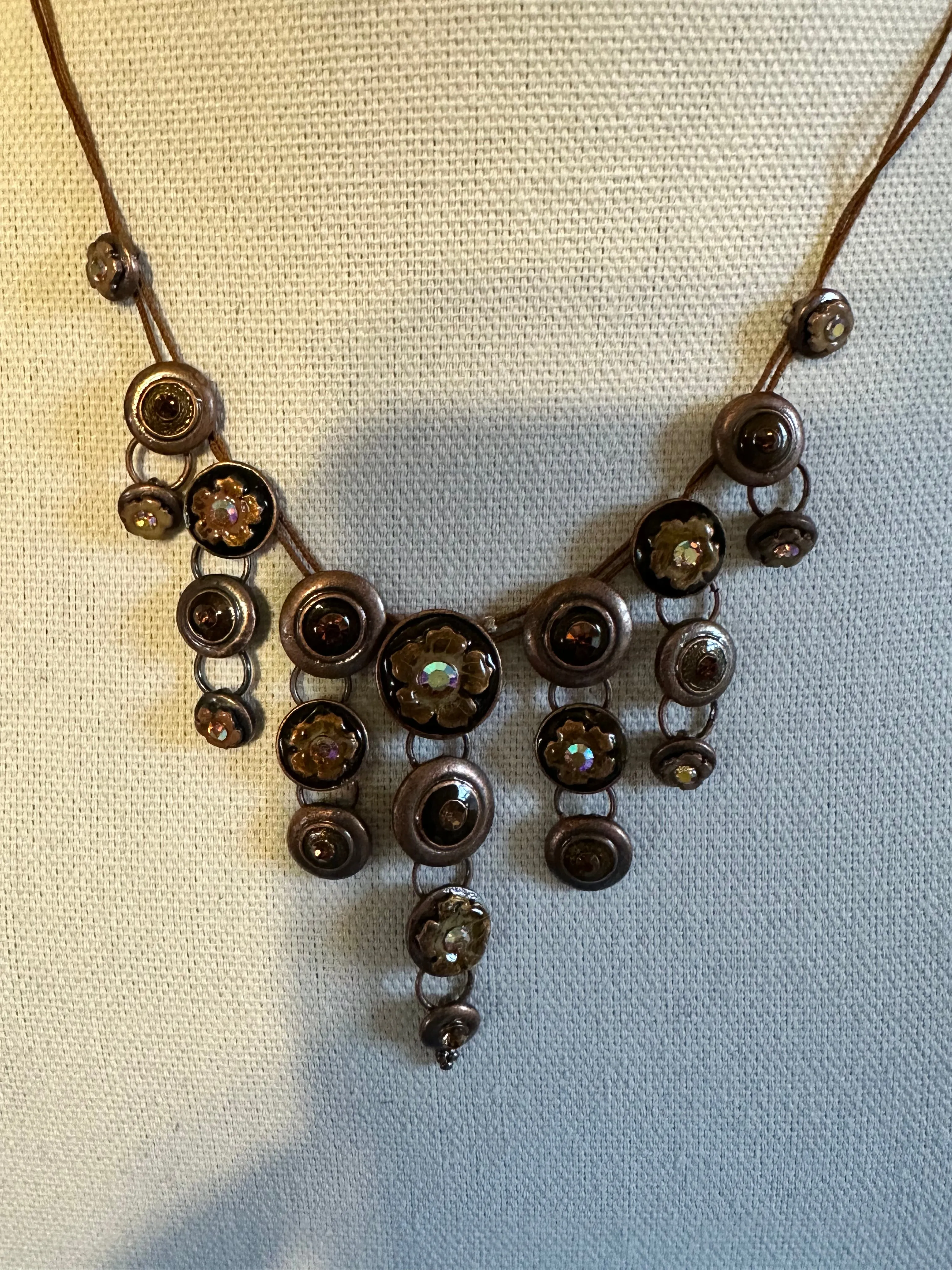 Circle flower bib style necklace in brown with earrings